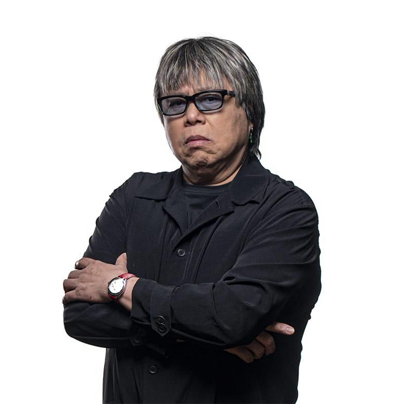a man with his arms crossed
